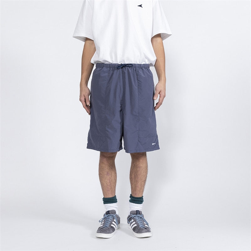 DESCENDANT DCDT Petite Baleine Broderie Nylon Séchage Rapide Short Fallow Pour Hommes Et Femmes