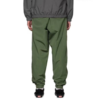 WTAPS pantalon en nylon de style décontracté décoré à fermeture à glissière latérale